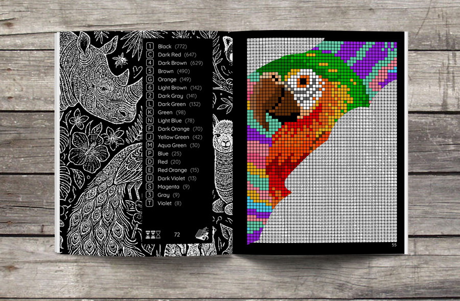 100 Animals – color by number book opened spread with parrot pixel art scene in progress